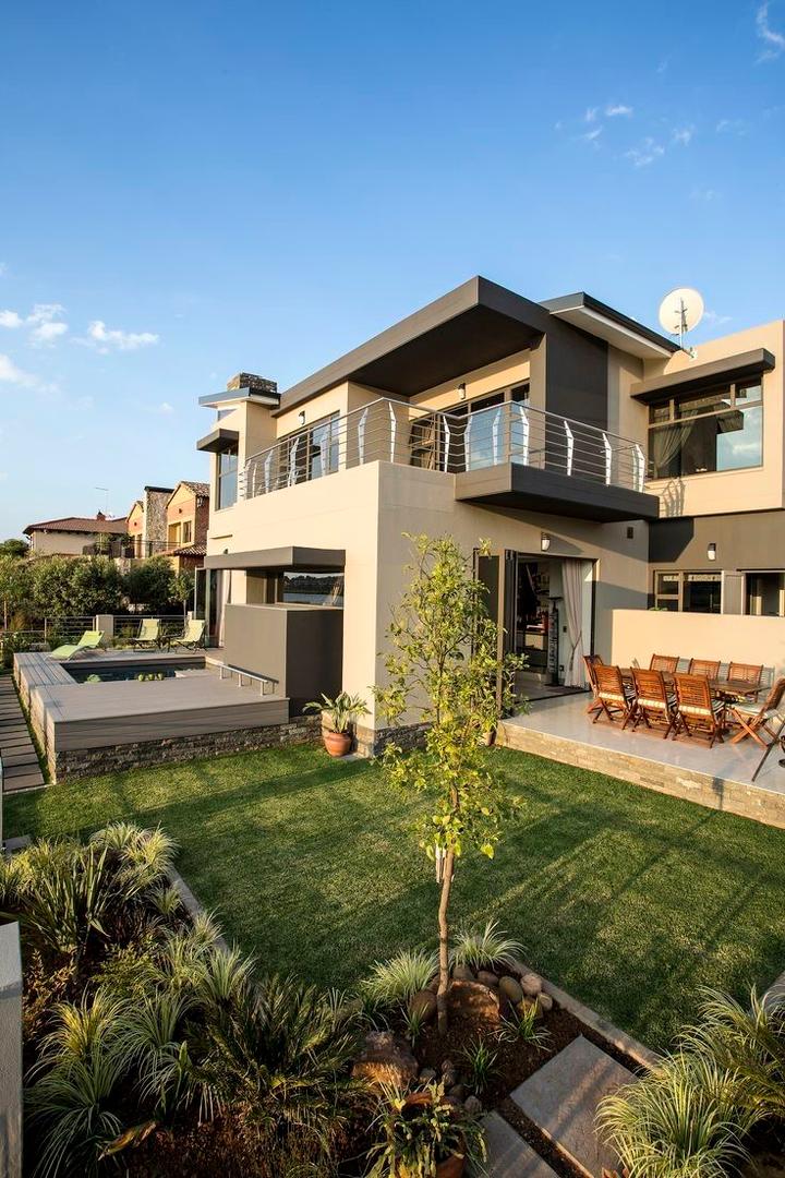 Real estate agent showing home in Kumasi